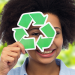 employee with recycling symbol in hand